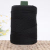 Spule schwarges 3mm Eisdraht-Crochetgarn für DIY-Bastelarbeiten mit grünem Abschlusspflege.