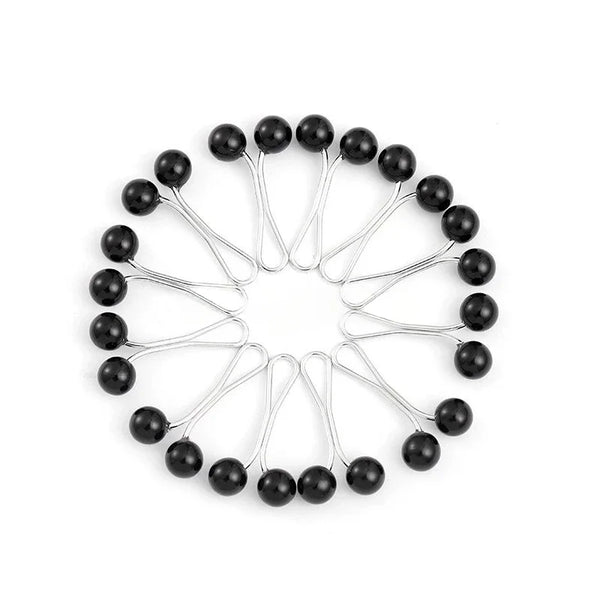 A set of twelve silver pearl hijab pins arranged in a circular pattern.