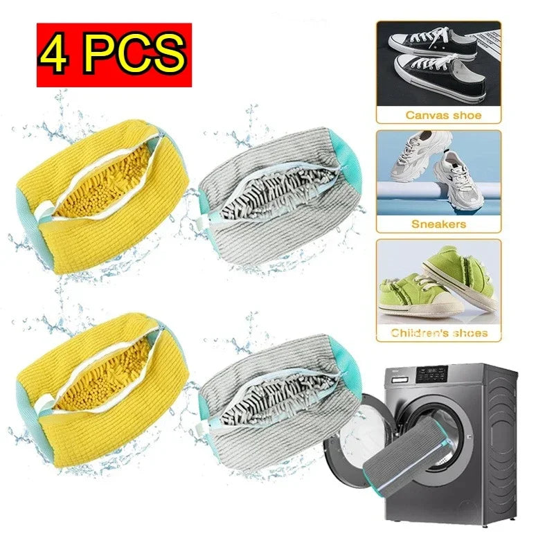 Four yellow and gray laundry bags with protective mesh nets for washing shoes are shown next to a washing machine.