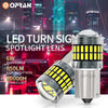 A silver LED turn signal spotlight lens with yellow light emitting diodes shown against a blurred background.