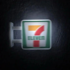 A miniature glowing storefront fridge magnet featuring the number seven and the word eleven on a green background.