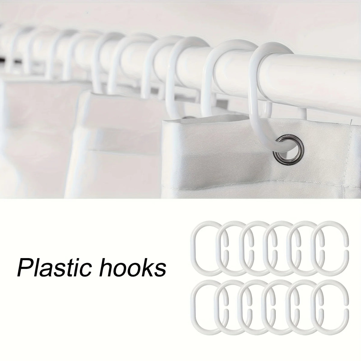 A set of white plastic hooks used for hanging bathroom accessories.