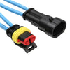 A waterproof automotive electrical connector kit showing a black male and yellow female terminal with blue wires.