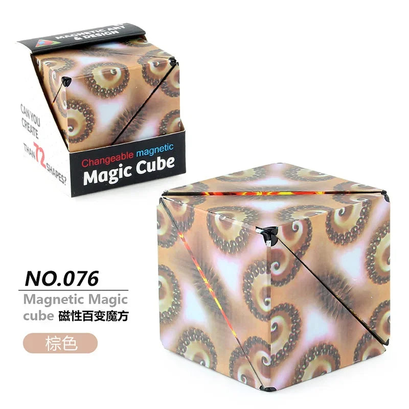 A magnetic magic cube puzzle in a gold and beige pattern shown next to its packaging.