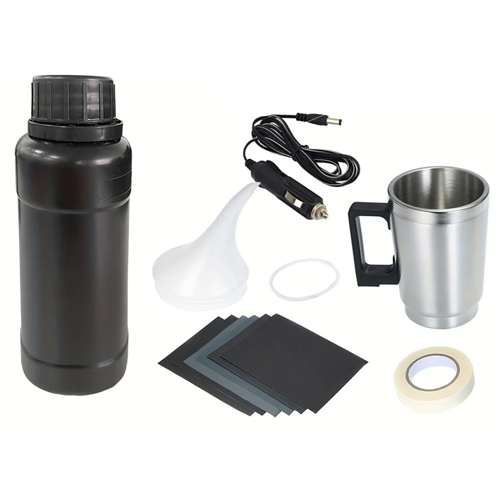 Headlight restoration kit including a black bottle, heating atomizer, electrical cord, and lens cleaning pads.