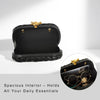Black handwoven clutch bag with a gold chain strap shown in an open view.