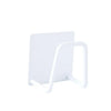 A white stainless steel wall-mounted sponge holder with a drain.