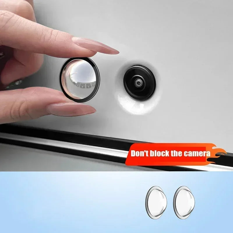 A hand is shown placing a protective cover over a camera lens on a car, with another set of covers displayed below.