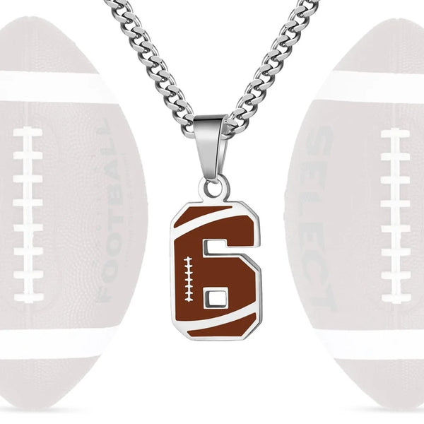 A stainless steel sports number necklace featuring the number 6 on a silver chain and pendant, set against a background of fo
