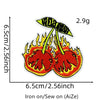 A yellow and orange embroidered patch depicting a stylized cherry engulfed in flames, designed for iron-on application.