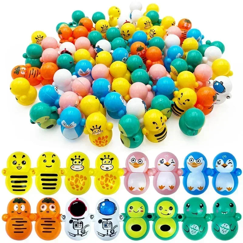 Assortment of kids party favors including snap bracelets, fidget toys, and other small toys
