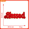 Red embroidered chenille iron-on patch spelling the word Blessed