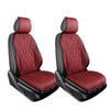 A pair of red quilted leather car seat covers with black trim and headrests.