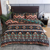 A patterned duvet cover set featuring geometric stripes in earthy tones of teal, orange, and brown.