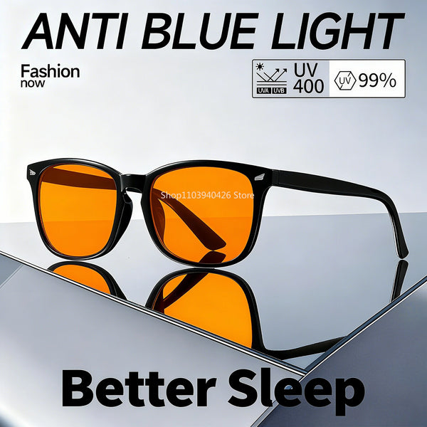 Gafas de color naranja sobre una superficie reflectante con protección anti-luz azul.