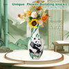 Unique flower building blocks featuring a panda design in a ceramic vase on a round pedestal.