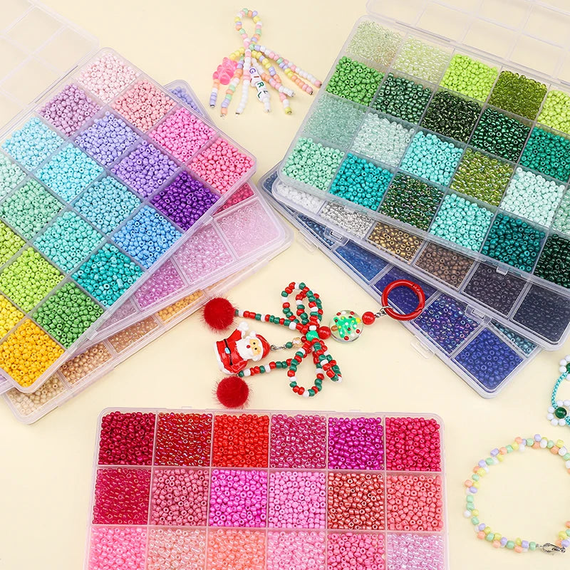 A collection of multicolor acrylic rice beads in various shades and colors stored in a grid box.