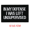 Black embroidered iron-on letter patch with white text reading In My Defense I Was Left Unsupervised
