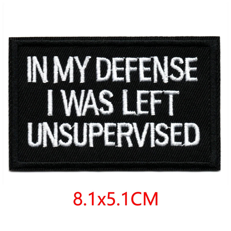 Black embroidered iron-on letter patch with white text reading In My Defense I Was Left Unsupervised