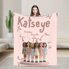 A pink microfiber fleece throw blanket featuring illustrations of several young girls.
