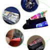 Close-up view of a wind-powered LED antenna light for vehicles showing various components and lighting features.
