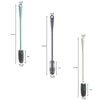 A silicone bottle brush with a long handle shown in various sizes and angles.