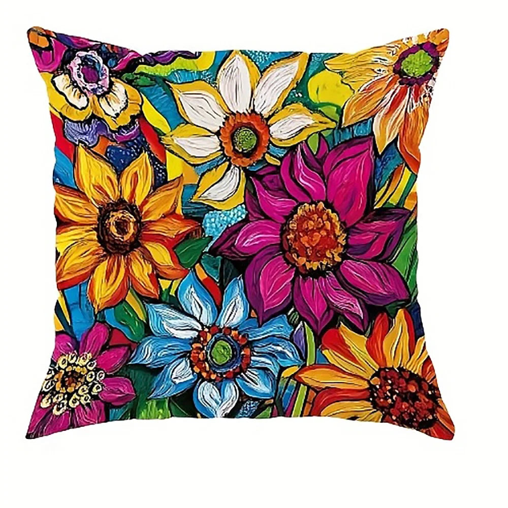 A decorative pillowcase featuring a vibrant floral print with yellow, pink, purple, and blue flowers.