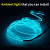 Flexible blue LED light strip coiled and illuminated against a dark background.