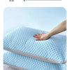 A light blue breathable cooling pillowcase is shown resting on a white surface.