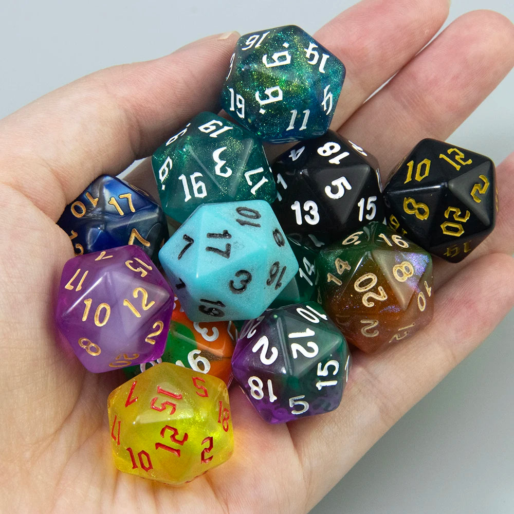 A hand holds a set of ten polyhedral dice with various colors and patterns for tabletop role-playing games