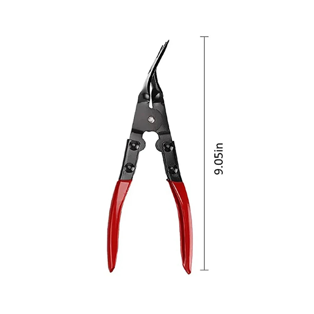 A pair of black and red automotive trim removal pliers with a measuring scale.