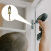 A hand uses a drill to install a heavy duty self-drilling drywall anchor into a wall opening.