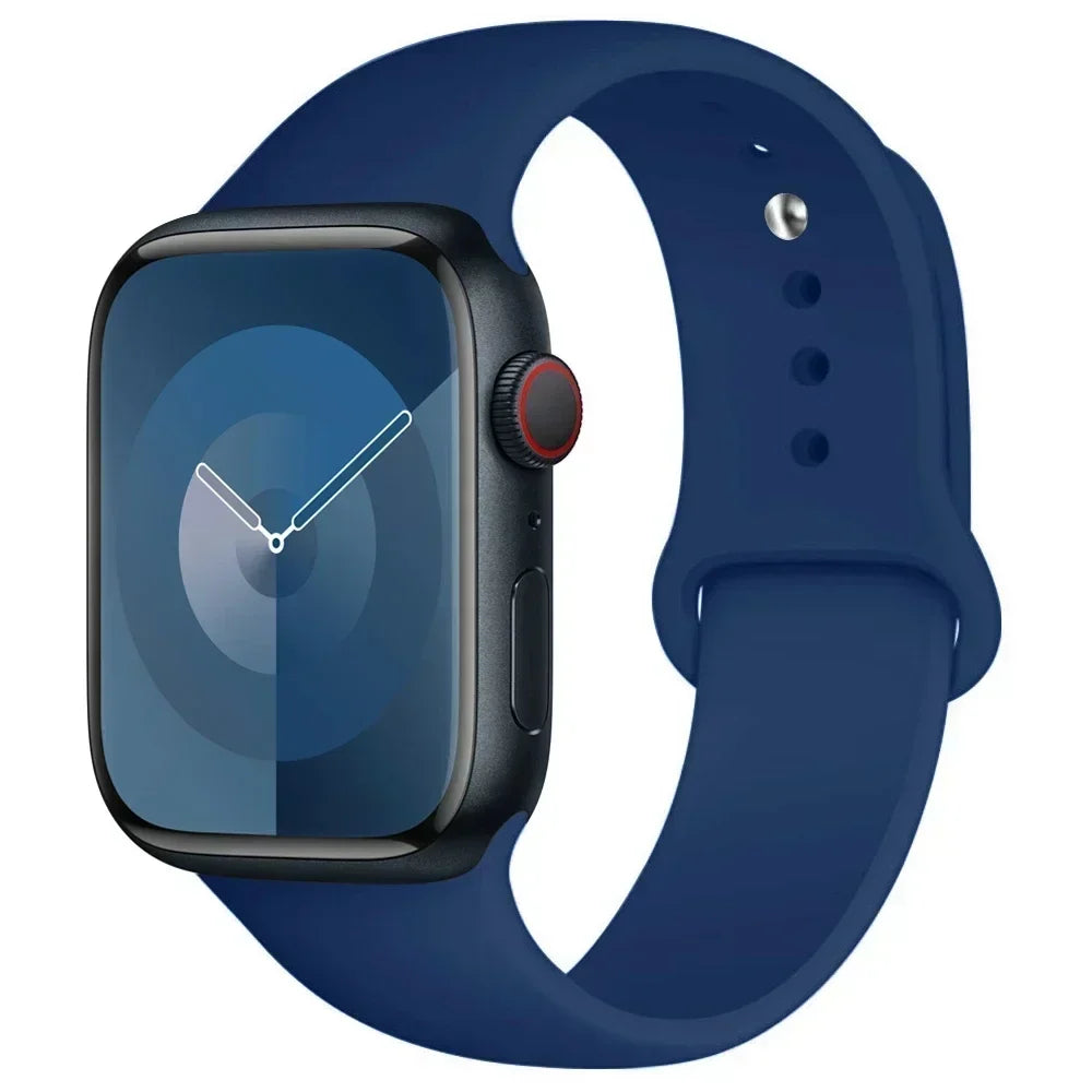 A dark blue silicone sport band for an Apple Watch shown next to the watch.