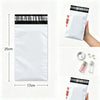 A white self-sealing mailing bag is shown next to a hand, with dimensions marked.