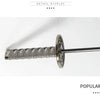A close-up display of a Demon Slayer Katana umbrella featuring a textured silver handle and blade.