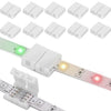 A collection of solderless L-shaped LED strip connectors for 4-pin RGB strips, shown in various white and green colors.
