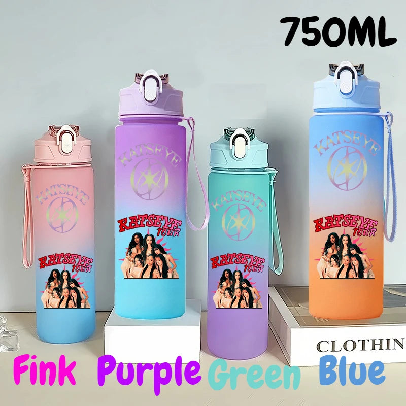 A set of 750ml portable sports water bottles in pink, purple, green, and blue colors displayed on a white surface.