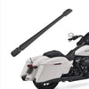 A black universal car radio antenna is shown mounted on a white motorcycle.