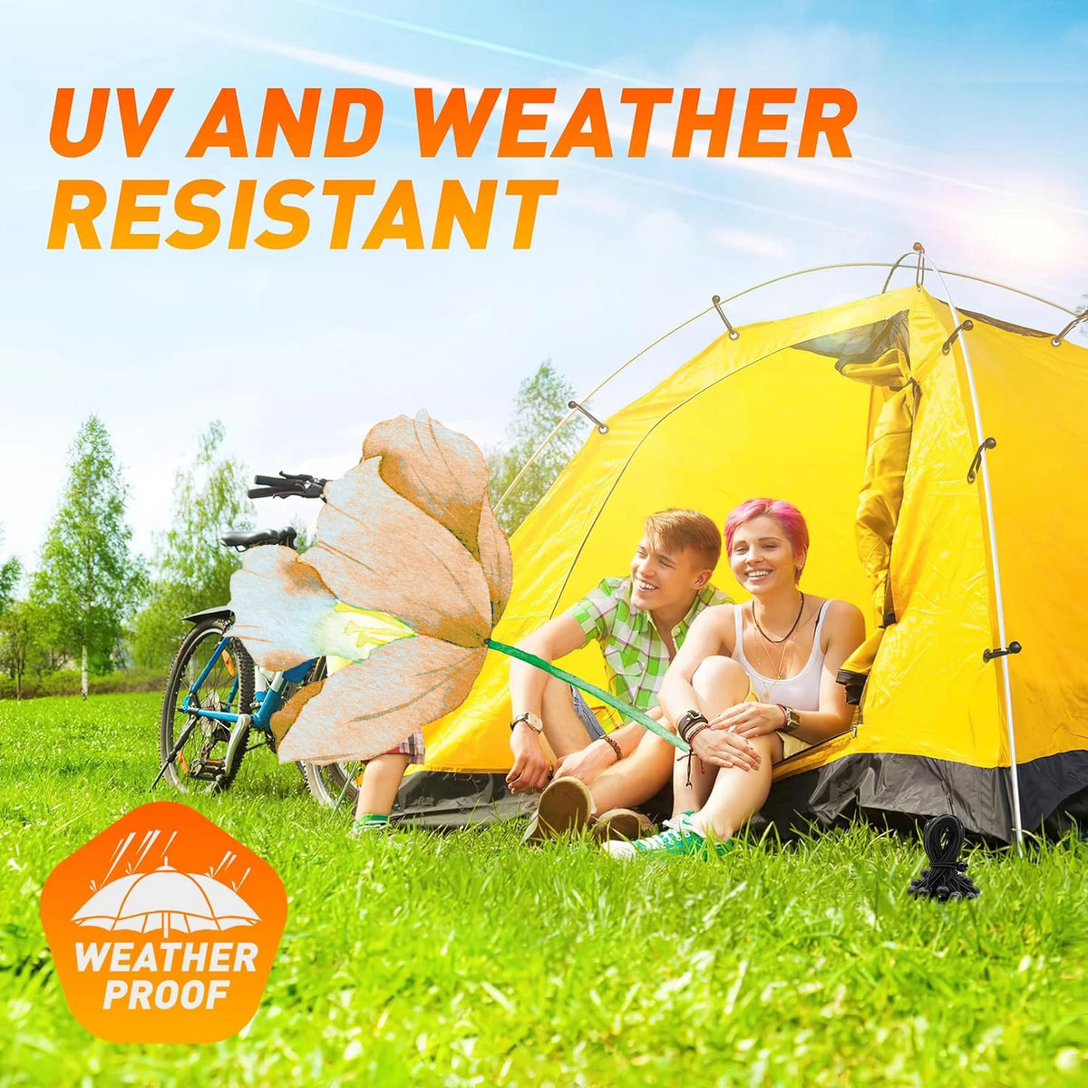 A family is relaxing inside a bright yellow, weather-proof tent outdoors on green grass.