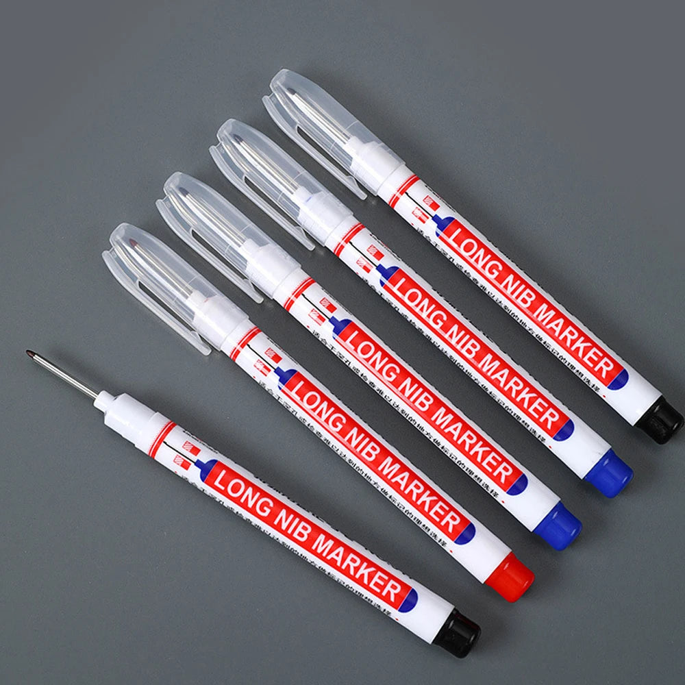 A set of six long nib markers for woodworking and construction, featuring white and red bodies.