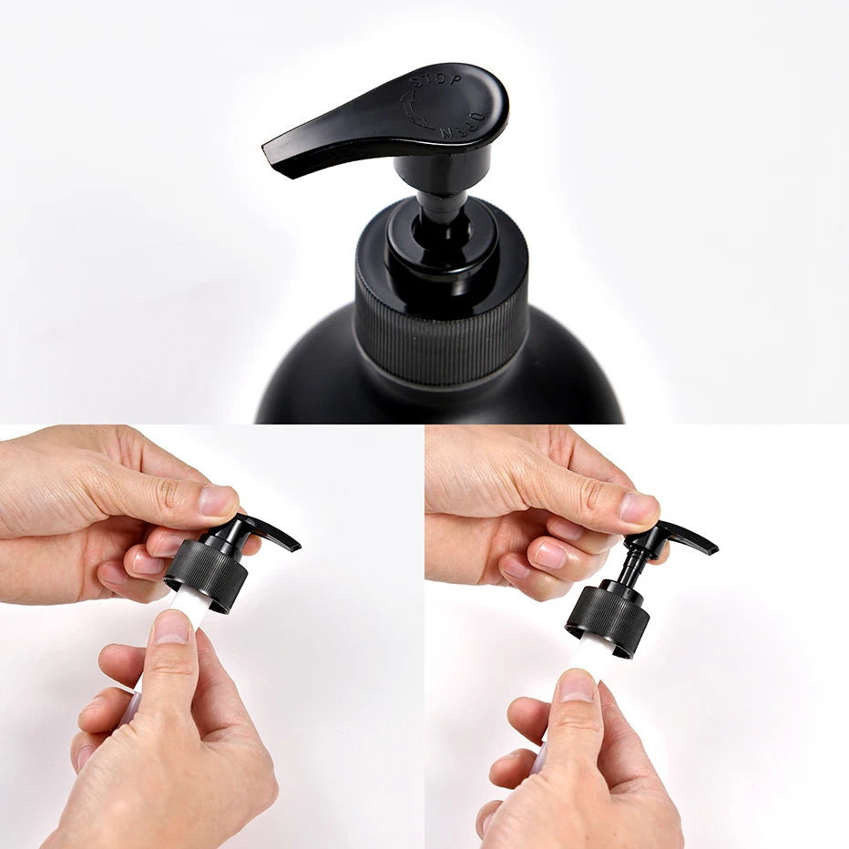 A black refillable soap dispenser bottle with a pump mechanism being held by hands.