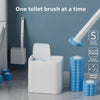 A white wall-mounted toilet brush holder with multiple blue disposable sponge brush heads for cleaning.
