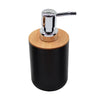 A modern bathroom organizer set featuring a chrome soap dispenser mounted on a black cylindrical base with a bamboo top.