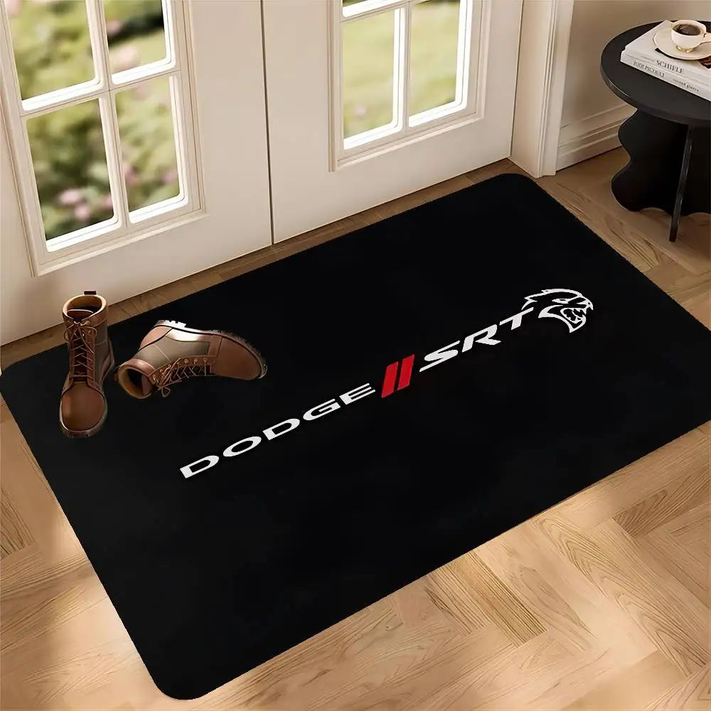 A black anti-slip doormat featuring the Dodge SRT logo and shoe silhouette on a wooden floor.