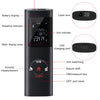 A black laser distance measurer device showing various indicators and buttons.