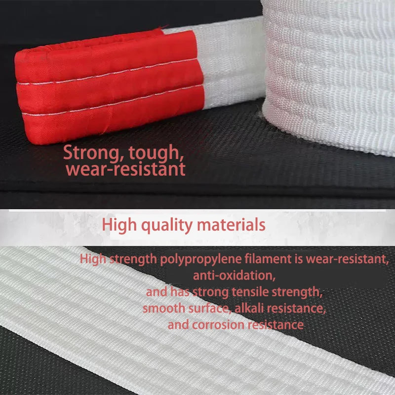 Red and white heavy duty tow rope with reflective stripes showing its durable material.