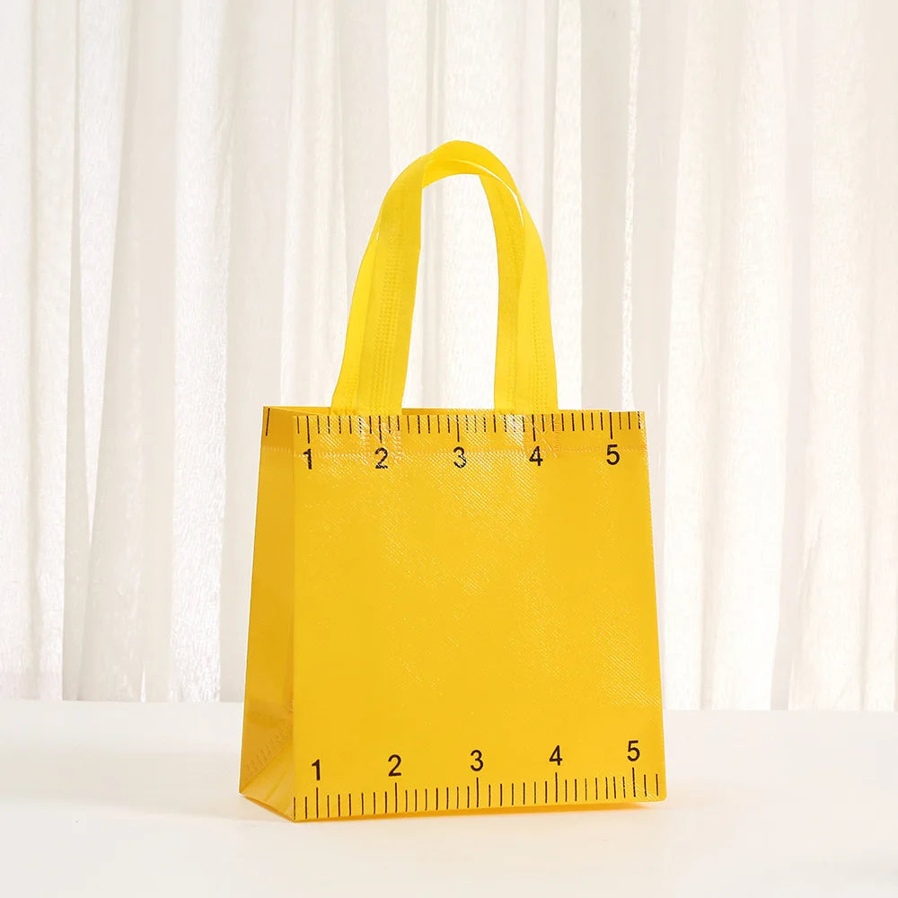 Colorful Non-Woven Gift Bags with Cute School Designs (12-Pack)