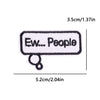 A rectangular embroidered patch with the text Ew People and a loop attached.
