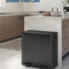 A modern, dark gray double trash can is placed on a kitchen countertop next to wooden cabinetry.