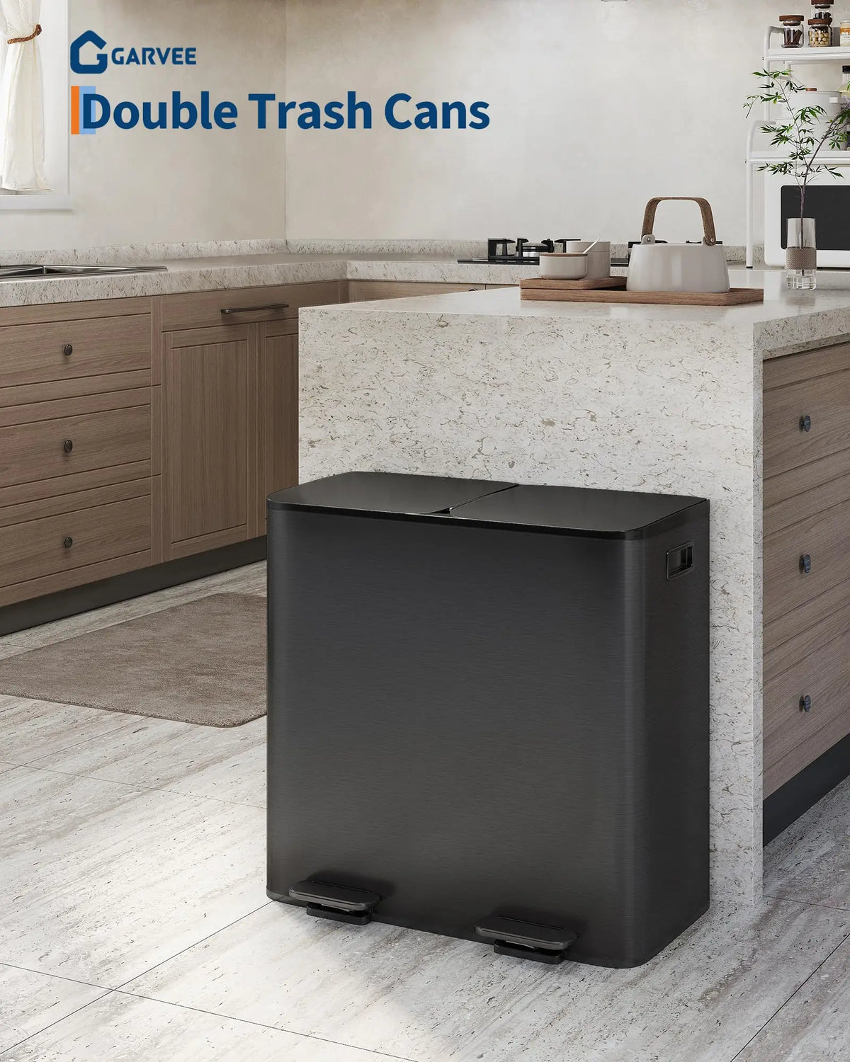 A modern, dark gray double trash can is placed on a kitchen countertop next to wooden cabinetry.